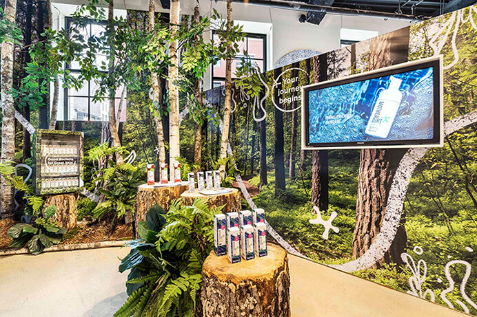 [Booth of cosmetic brand sells organic products]